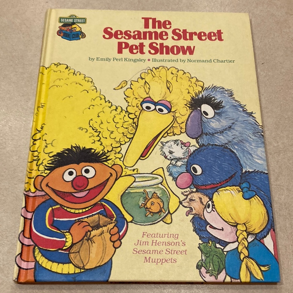 Vintage Sesame Street book club book entitled “ The Sesame Street pet show.”